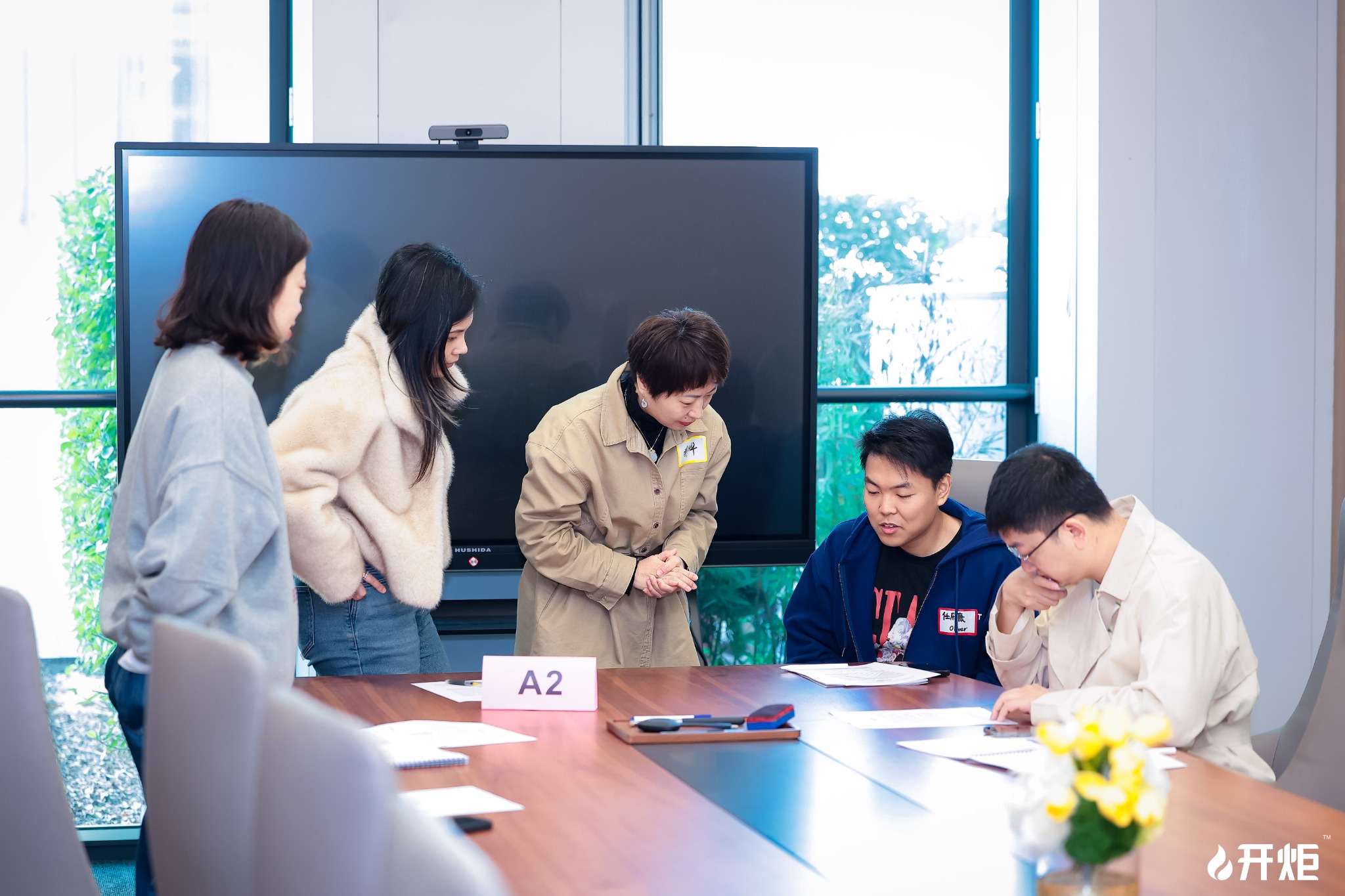 Oliver discussing with students in a selection and coaching setting